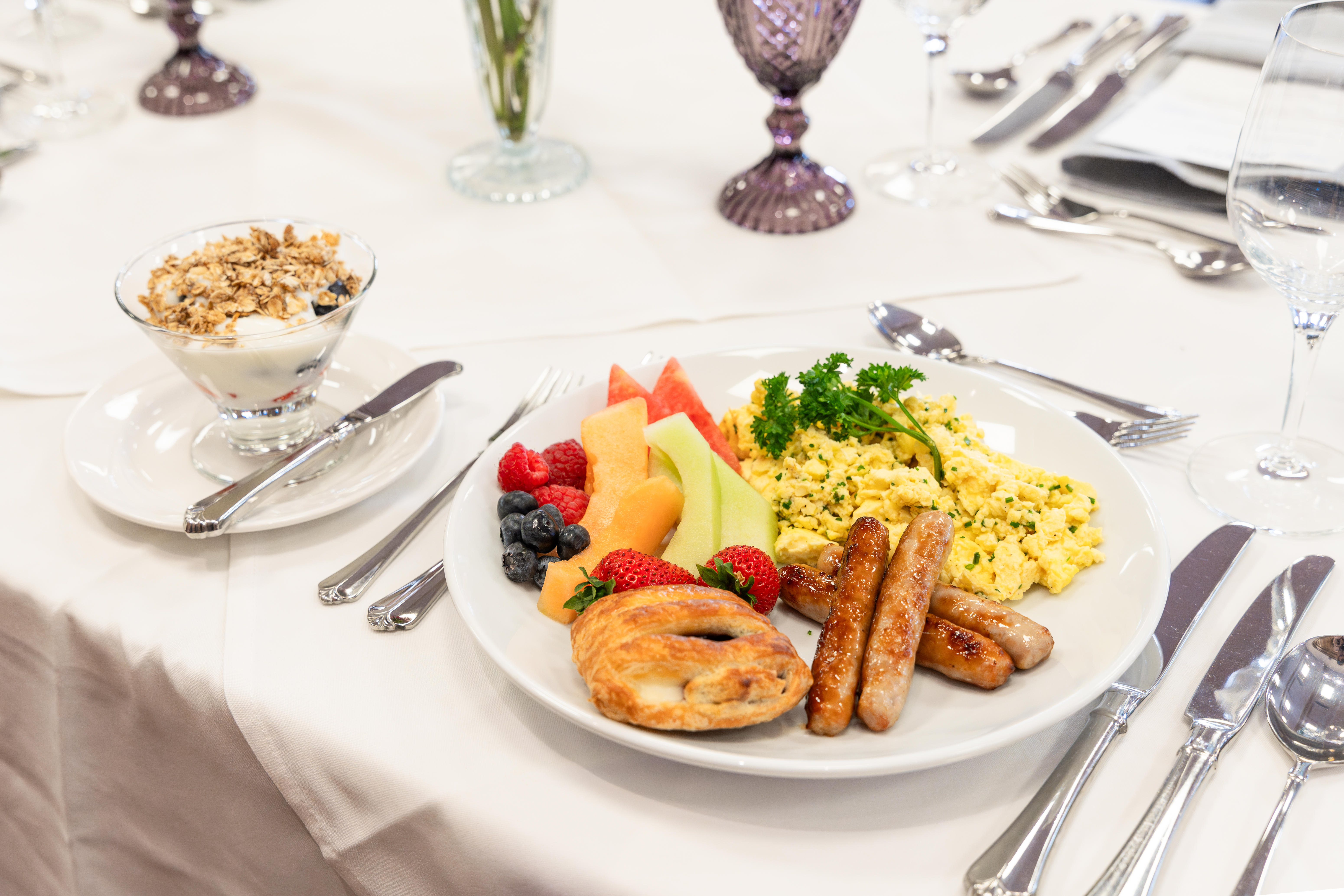 A plate with breakfast items